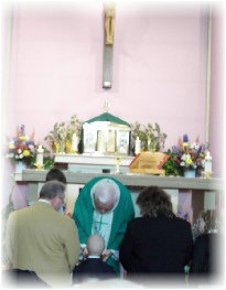 Davey receiving his First Communion